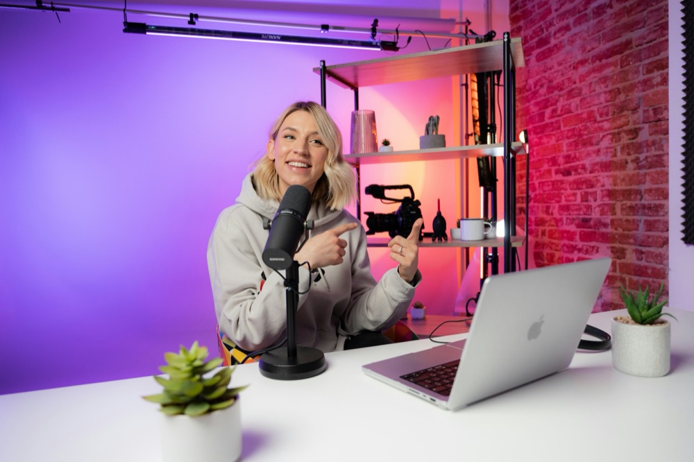 Creator recording in a lit studio setup